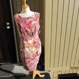 #735  NEW WOMAN'S FLORAL DRESS BY CONNECTED APPAREL  (SIZE 16)